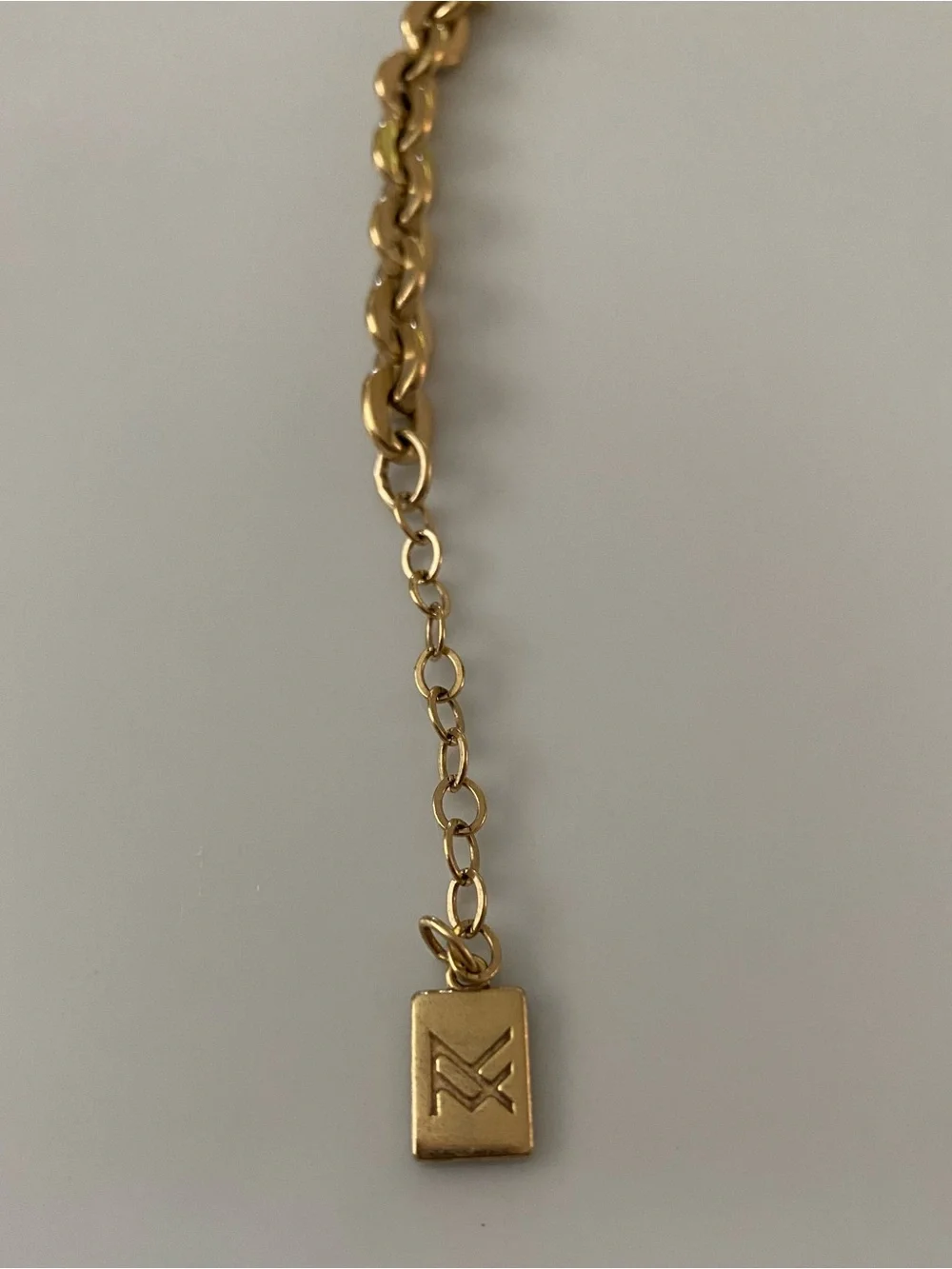 Gold Chain Link Bracelet with Branded Square Tag